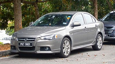 What was the first indigenously designed car produced by Proton?