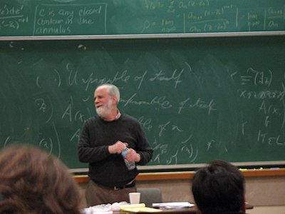 What aspect of language did Saul Kripke's theories revolutionize?