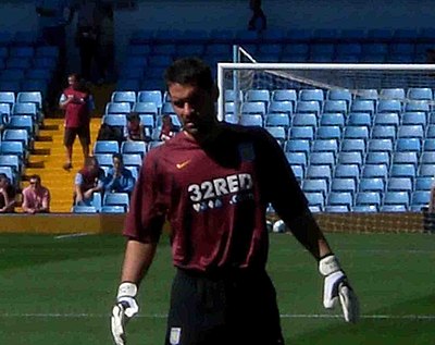 In which year did Scott Carson sign permanently for Manchester City?