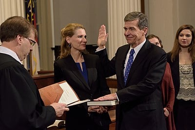 In which branch of the North Carolina General Assembly did Cooper serve from 1987 to 2001?
