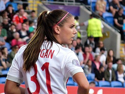 With which American soccer player did Alex Morgan join the exclusive 20 goals and 20 assists club?