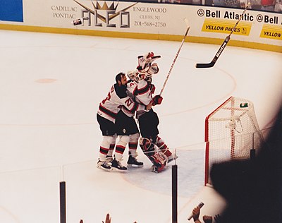 What is the defensive strategy that the Devils popularized in the mid-1990s?