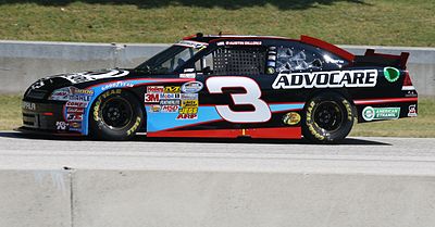 Which series did Austin Dillon compete in full-time before moving to the NASCAR Cup Series?