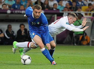 In which competition did De Rossi’s Italy finish second in 2012?