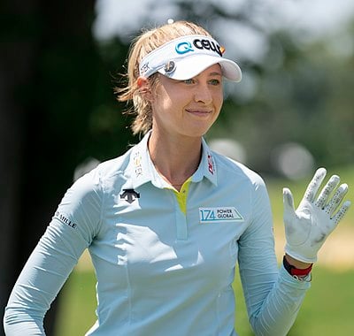 Who is Nelly Korda's sister, who is also a professional golfer?