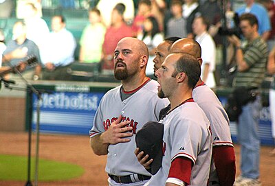 How many times was Youkilis listed on the Sporting News' list of the 50 greatest current players in baseball?