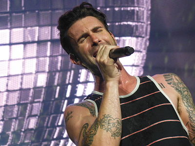 How many seasons of The Voice did Adam Levine's team win?