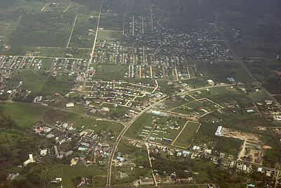 What is the rank of Belmopan in terms of population among settlements in Belize?