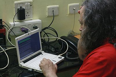 What is the term Richard Stallman uses to describe software that ensures users' freedoms?