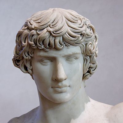 What was the name of the cult devoted to Antinous' worship?