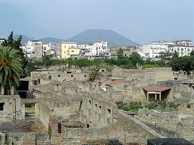 What natural disaster led to the destruction of Herculaneum?