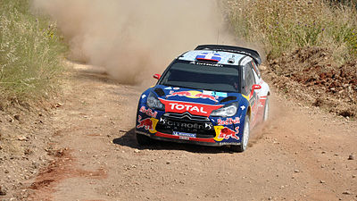 In which year did Sébastien Loeb win the Junior World Rally Championship?