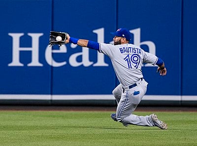 For how many seasons did Bautista lead MLB in home runs?