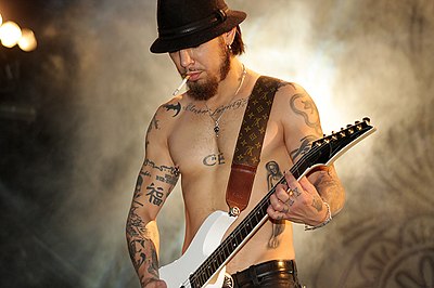 What instrument is Dave Navarro best known for playing?