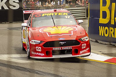 Which car number does Scott McLaughlin drive in the IndyCar Series?