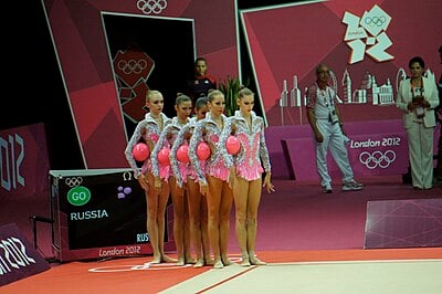 How many times has the Russian group in rhythmic gymnastics defended their Olympic title consecutively as of 2012?