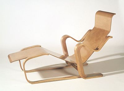 Which chair designed by Breuer is known for its tubular steel frame?