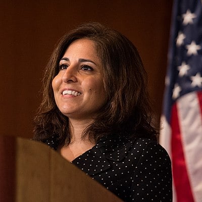 How long did Neera Tanden work with the Center for American Progress before joining the Biden administration?