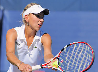 Elena Vesnina holds how many titles in mixed doubles?