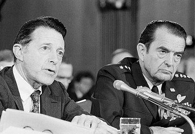 How many decades did Weinberger serve in state and federal positions?