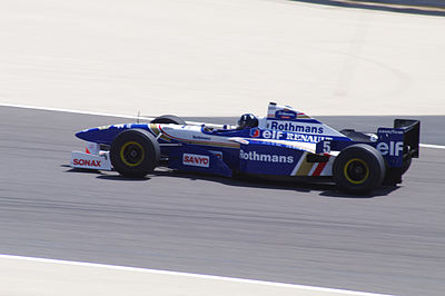 Damon Hill was the main rival for which German driver during the mid-1990s?