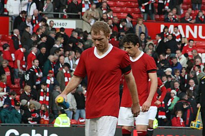 Till when did Scholes represent the England national team?