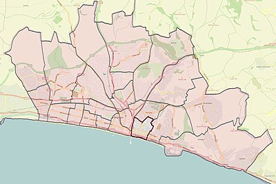 Which two seaside resorts make up the district of Brighton and Hove?