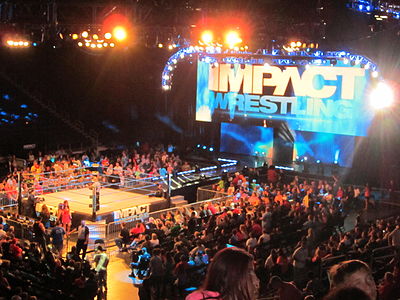 What is the parent company of Impact Wrestling?