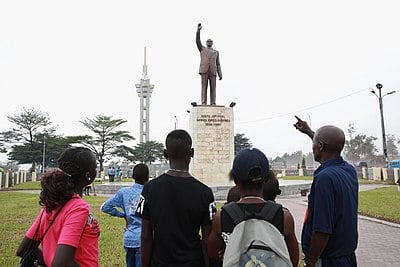 In which city did Lumumba attempt to escape to after Mobutu's military coup?