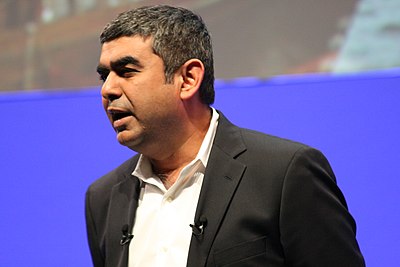 In which industry does the BMW Group, where Vishal Sikka serves on the supervisory board, primarily operate?