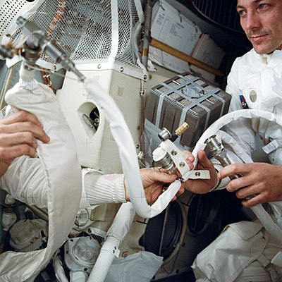 Which Apollo mission did Swigert serve as command module pilot?