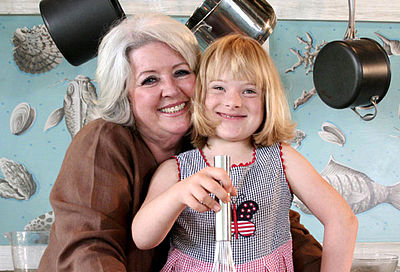 What is the title of Paula Deen's first cookbook?