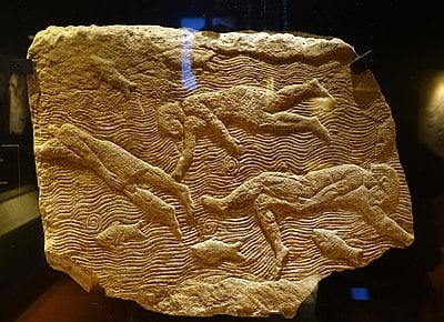 How is Ashurbanipal's artwork characterized?