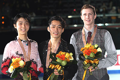 In which event did Daisuke Takahashi become the first Asian man to win a World title?