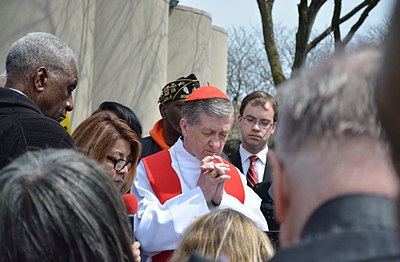 As a cardinal, Cupich now participates in what significant event?