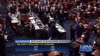 Why did Betsy DeVos resign as Secretary of Education?