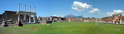 How many visitors does Pompeii attract annually?