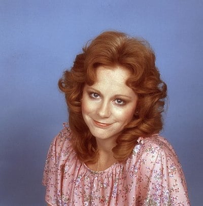 Which Reba McEntire album features the number one single "The Heart Is a Lonely Hunter"?