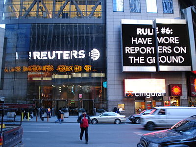 What is the symbol for Thomson Reuters on the New York Stock Exchange?