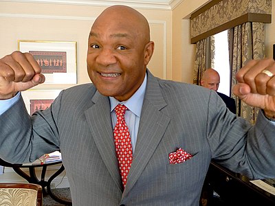 George Foreman had a significant religious experience after a loss to whom?