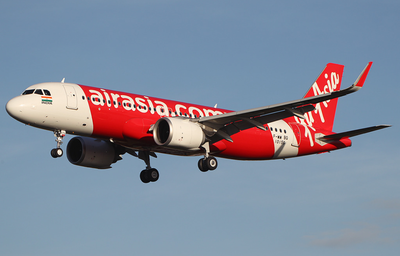 What percentage of stake did AirAsia Bhd sell to Tata Sons?