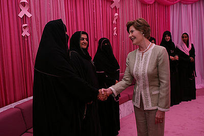 Which cause did Laura Bush advance through The Heart Truth and Susan G. Komen for the Cure organizations?