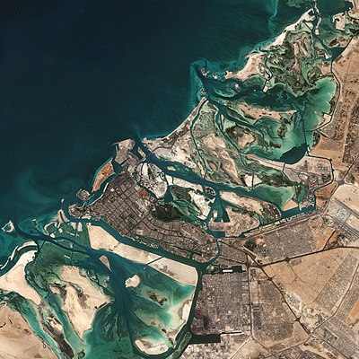 In which body of water is Abu Dhabi's island located?