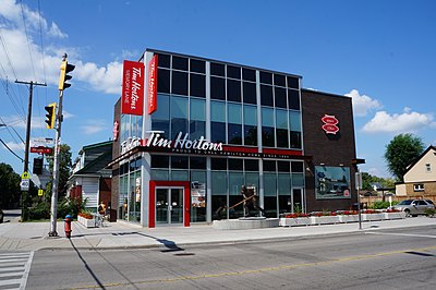When did Burger King agree to purchase Tim Hortons?