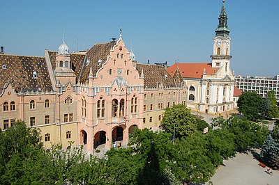 Besides Kecskemét, which city is a centre of the Southern Great Plain?