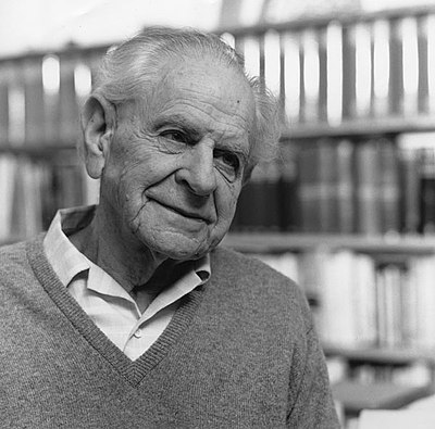 What did Karl Popper replace the classical justificationist account of knowledge with?