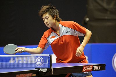 What historical table tennis event for Singapore did Feng contribute to in 2008?