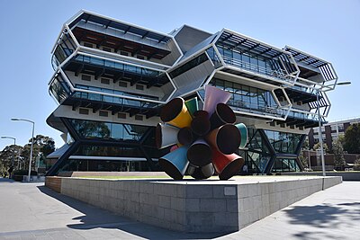 In which country does Monash University offer courses at other locations besides Australia?