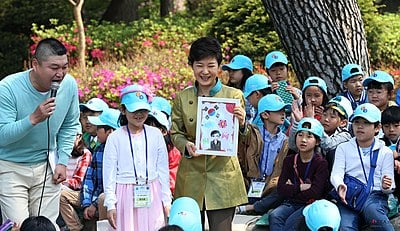 Where did Park Geun-hye rank on the Forbes list of the world's 100 most powerful women in 2013 and 2014?