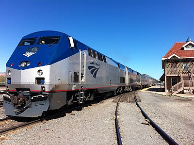 How many U.S. states does Amtrak serve?